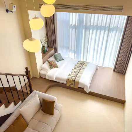 Weihai Shibeiwu Scenic Apartment (Weihai Railway Station Huafa Jiulong Bay)