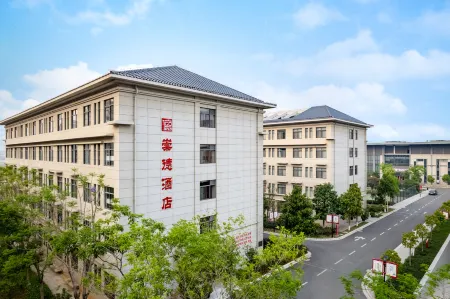 Chongde Hotel (Mengzi Municipal Government Branch) Отели в г. Мэнцзы