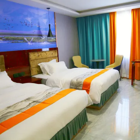 Kuqa Xinyu Hotel (Guiz Plaza)