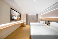 Baide Business Hotel (Qitaihe Pedestrian Street)