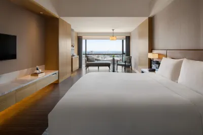 โรงแรม นิวเวิลด์ หลางฝาง โรงแรมใกล้เขตเหนือของวิทยาลัยเทคนิคและเทคโนโลยีหนองเฟง