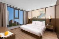 Heyue Business Hotel (ENJOY.LAND) - Flughafentransfer