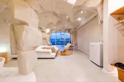 Huarong Designer Homestay (Kunming South Railway Station Colorful Yunnan Diyicheng Branch) Hotell i Chenggong District