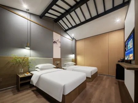 Wanjia Courtyard Hotel (Taierzhuang Ancient City Scenic Area) Отели рядом с достопримечательностью «Zaozhuang Technician College Tai'erzhuang Branch»