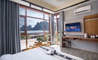 Yangshuo Homecoming Hotel (Jinlongqiao Wharf Bamboo Rafting Branch)