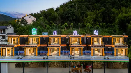 Woodpecker Homestay Отели рядом с достопримечательностью «Shanmendong Sceneic Area»