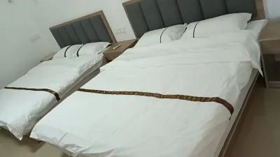 Youke Elevator Apartment Hotels in Yuanzhou