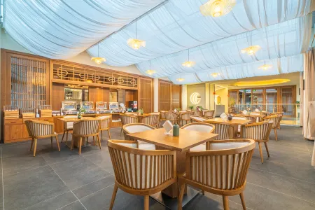 Pan Zhi Hua Rezen Hotel Отели рядом с достопримечательностью «Datian Convention Relic Site»