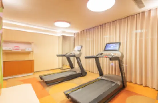 Orange Hotel (Xinyang East Station Branch）