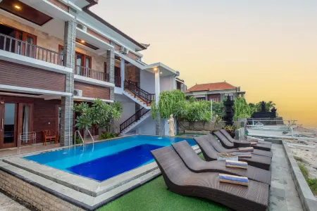 Barton Beach Inn Отели рядом с достопримечательностью «Giri Putri Cave»