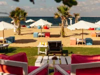 Paradise Inn Beach Resort Hoteles cerca de Playa Mamoura