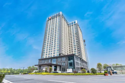 Luoyang Tangdu Yijing International Hotel Hôtels à proximité de : Xingjian Yanshi Stadium Monument