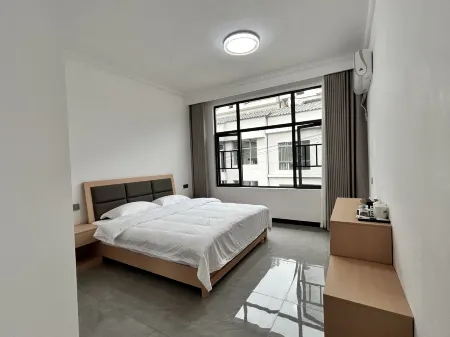 Xinning Yueting Nanshe Homestay (Langshan Scenic Area) Отели рядом с достопримечательностью «Langshan National Park»