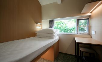 wohkoon Zhexingsun Youth Hotel (Beijing Beiyuan Subway Station Branch)
