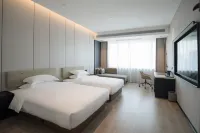 Yibin Meijing Hotel (Yibin Railway Area)