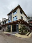 Shuyuan Xiaozhu Homestay · - parking