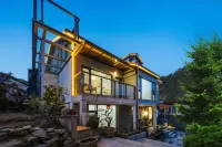 Flower Building Lushan Luyinqi Homestay (Lushan Scenic Area Cableway Station)