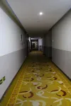 Q+ Nanxiong Xinhewan Business Hotel