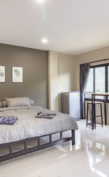 ห้องดีลักซ์ เตียงใหญ่ 1 เตียง