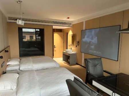 Wanzai Yintong Concept Hotel Отели рядом с достопримечательностью «Wanzai Dazhong Polytechnic Science & Technology School»