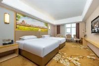 維也納國際酒店（茂名高鐵站陽羚店） 鄰近普羅蒙蒂意大利藝術塗料定製館的酒店