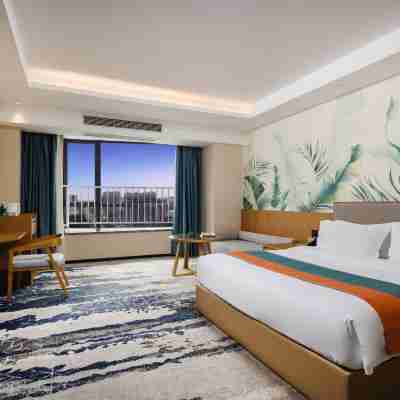 曼居酒店（海南店） Rooms