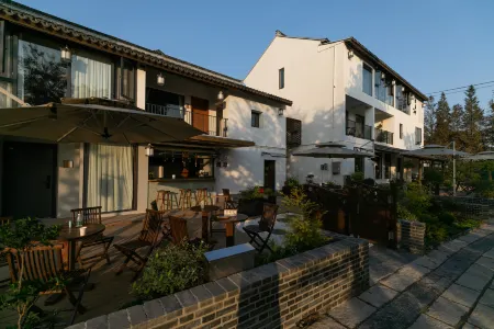 Tsingpu Liyao Village House Отели рядом с достопримечательностью «Shanghai Wanfo Pavillon»