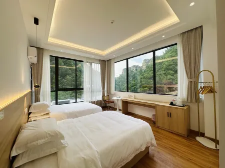 Hualishanshe B&B (Huoshan Painter Village Yixiantian Scenic Area Branch) Отели в г. Хошань