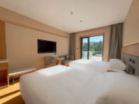 Yuanfang Shanshe Homestay Hotel (Rumeng Qikou) Các khách sạn ở Huyện Lâm