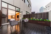 Mercure Qingdao Zhanqiao Seaview Hotel - bar
