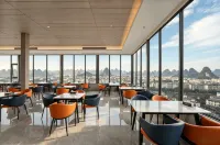 Versailles Hotel (Guilin Two Rivers and Four Lakes Railway Station Branch) - 4 estrellas
