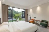 Zimu Home Homestay (Anji Dragon Encounter Grand Canyon Rafting) - Mountain view