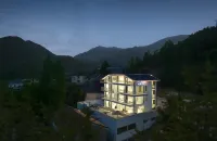 JANE Hot Spring Hotel (Anji Yunshang Grassland Panda Tribe Adventure Park Branch) Hotels near Chuancun