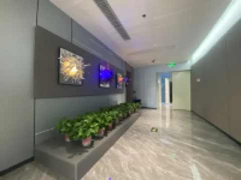 Kumamoto E-sports Hotel (Queshan Jingyu Plaza) Hotels in Queshan