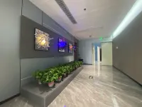 Kumamoto E-sports Hotel (Queshan Jingyu Plaza) Hotels in Queshan