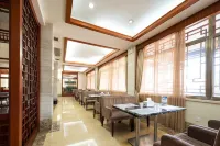 โรงแรมบ้านสวนเถาฮวาซานเชิงนิเวศ - พร้อมอาหารเช้า