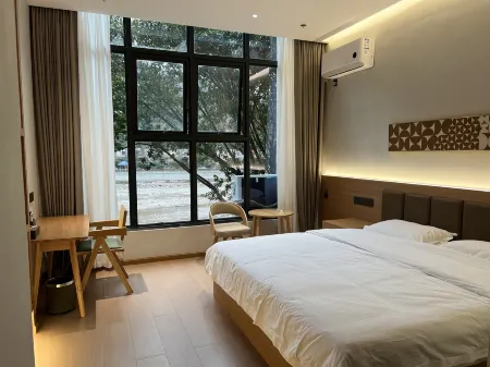 Yingjing Lanting Light Residence Luxury Hotel Отели рядом с достопримечательностью «Niubei Mountain»