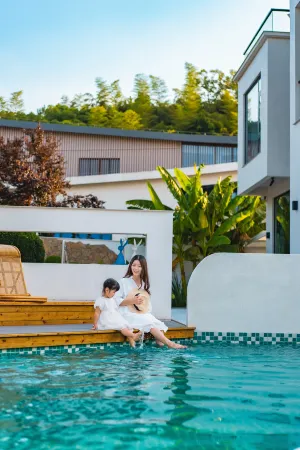 Jianyin Jianyin Design Resort (Huzhou Chang'er Giraffe Manor) Отели рядом с достопримечательностью «Yuanxiangxiaozhen Sceneic Area»