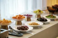 Mo Shang Qing Ju Hotel (Quliang Garment Industrial Park, South University Road, Zhengzhou) - sarapan