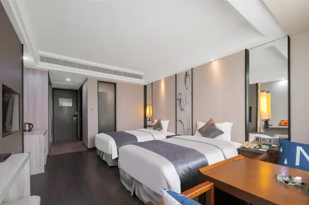 Xiamen Xingrong International Hotel (Tong'an Huancheng South Road Branch) Отели рядом с достопримечательностью «Susong Park»