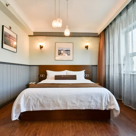 Yi Fei Hotel (Harbin Institute of Technology) Отели рядом с достопримечательностью «Колледж Jiangnan-Библиотека Университета Мастера Харбина»