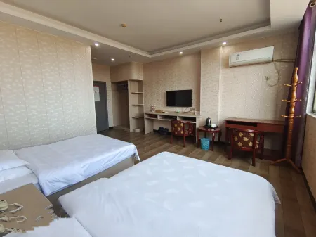 Xinganyutai Business Hotel Отели рядом с достопримечательностью «Zhu De Commander in Chief Mrs. Xiao Jufang Former Residence»