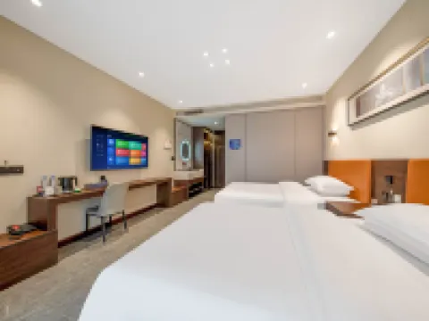 Juntang Hotel (Xinmi Quliang Industrial Park South University Road Branch) Hotels in Xinmi
