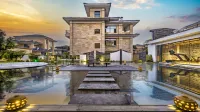 Xiting Wuyu Hot Spring Hostel Отели в г. Тенчун