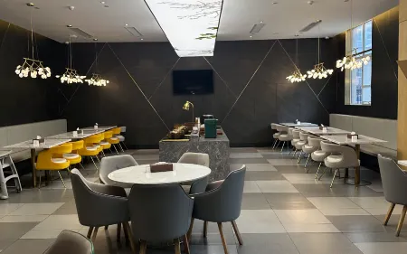 Orange Hotel (Heze Renmin Road) Отели рядом с достопримечательностью «Heze University North Campus»