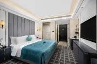 โรงแรมซานา ดีลักซ์ จินเฟิง อิ๋นชวน โรงแรมใน