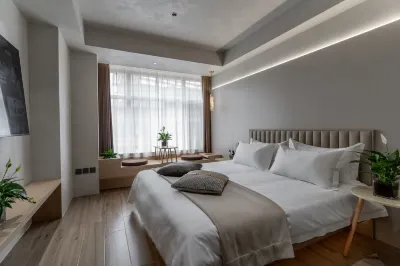 Yubwiku Tang Business Hotel (Tangshan Wuyue Plaza)