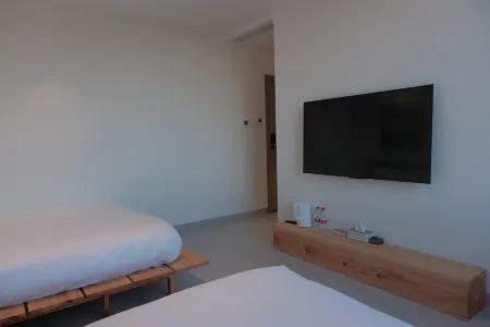 Sunset Island Luxury Seaview Homestay Отели рядом с достопримечательностью «Jinshawan Coastal Park»