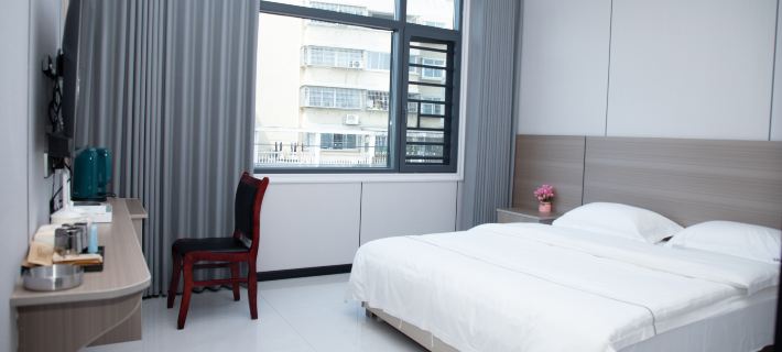 Baige Hotel (Xintiandi Pedestrian Street) Отели в г. Шаошань