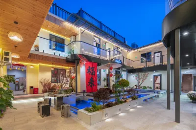 Three Autumns' Reverie Boutique Inn Hotel dekat Lijing Gate